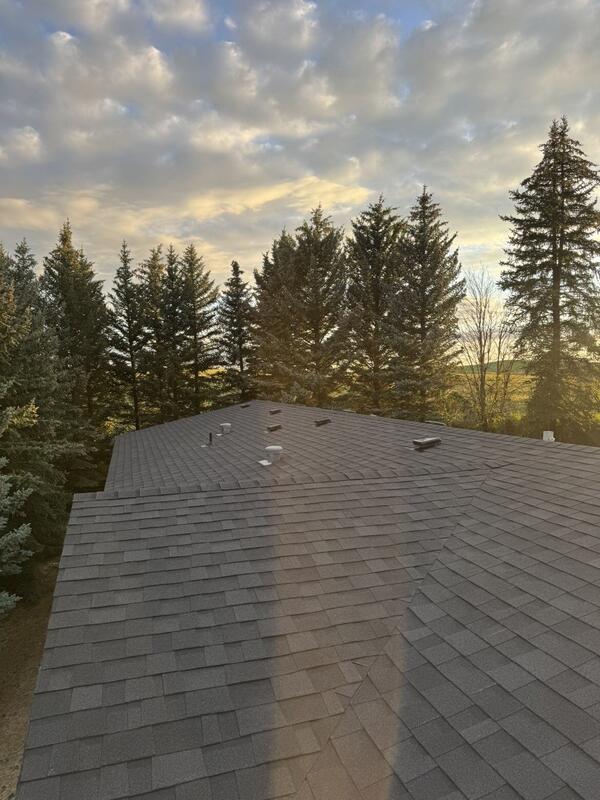 Evening light on a freshly installed shingle roof