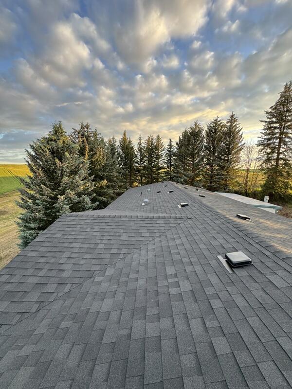 New roof at golden hour with farmland views