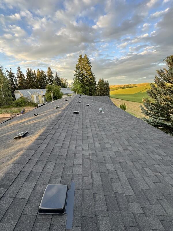 New shingle roof with the Palouse hills in the distance